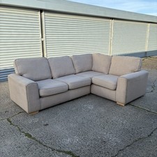 Beige L shape corner sofa with